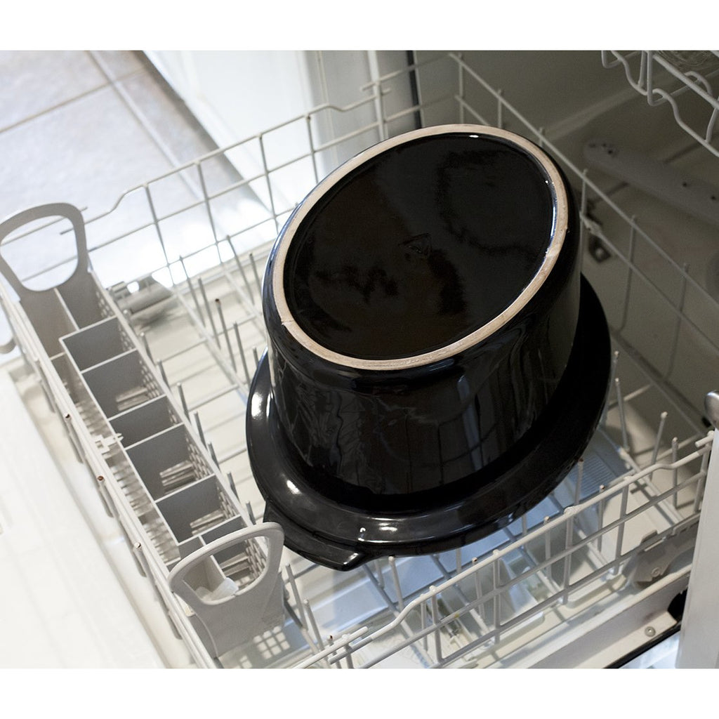 Inner ceramic pot is placed inside a dishwasher rack.